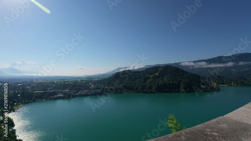 Breathtaking high angle view of Lake Bled, Slovenia, with mountains on a sunny day