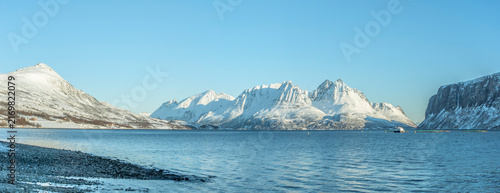 Canvas Print Snowy mountains and fjord landscape in Uløya, Troms County, Norway