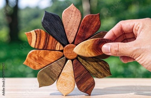 Handmade Wooden Flower Petals Nature Craft Concept.