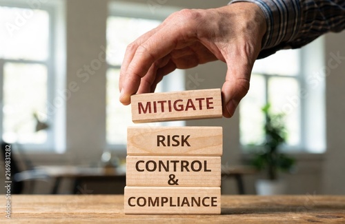 Business Concept Mitigate Risk Control and Compliance.