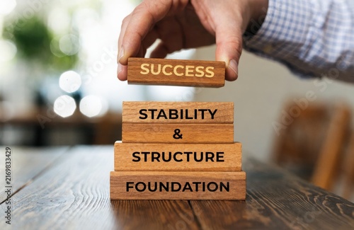 Building Success Foundation Stability Structure Wood Blocks.