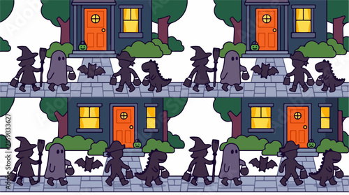 Halloween trick or treaters walking on sidewalk