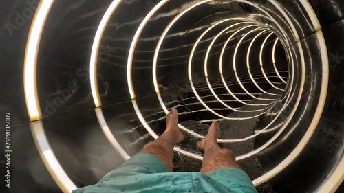 Water Slide Ride Through Black Tunnel With Glowing Rings and Splashing Water POV