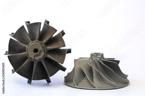 Obraz na płótnie Automotive turbocharger turbine wheel rotor and compressor impeller isolated on white background