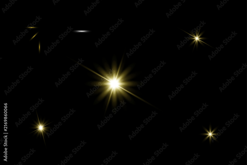 Fototapeta premium Golden sparkle starburst light collection with glowing burst elements on black background