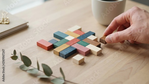 Colorful Wooden Cross Pattern Business Creativity Concept.