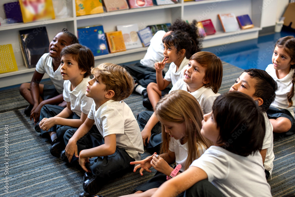 Fototapeta premium Engaged children in classroom learning