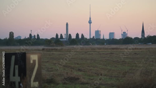 skyline of Berlin downtown from Tempelhofer Feld at sunrise 4K