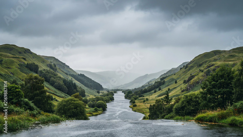 Serene mountain landscape with winding river path through pine forest