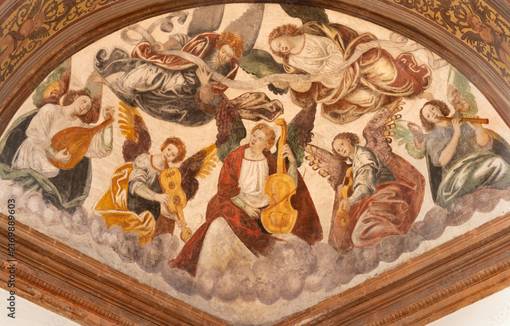 Fototapeta premium Busto Arsizio - The fresco of angels with the music instruments in the church Santuario di Santa Maria di Piazza by Giovan Battista della Cerva (1542).