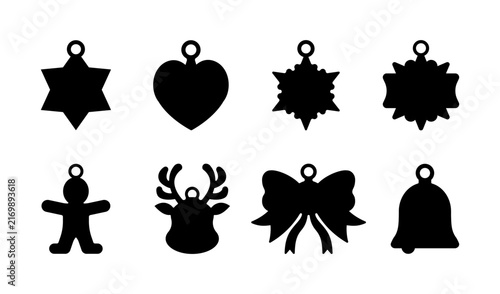 A set of black silhouette icons representing various traditional Christmas symbols, perfect for seasonal design projects