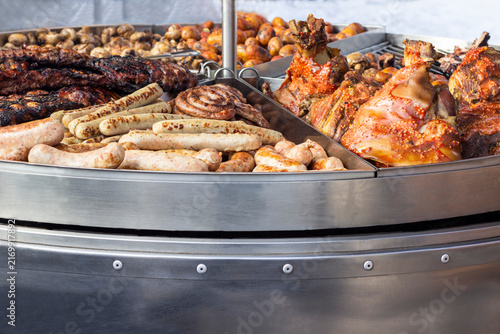 Close-up of grilled meat on a large grill