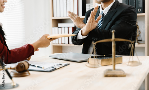 Obraz na plátne Concept of corruption, bankruptcy court, bail, crime, bribery, fraud, Judge Gavel, soundboard and a handful of cash on the table