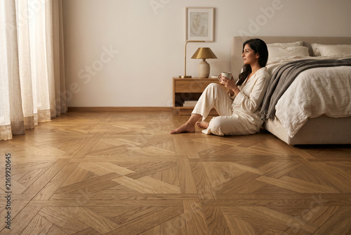 young man sitting on floor
