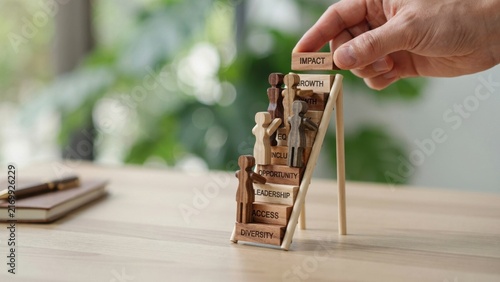 Businessman hand building wooden block staircase with ladder for career ladder and growth concept.