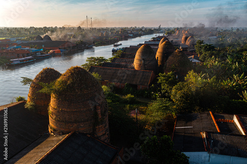 Canvastavla Aerial panoramic view of Mang Thit pottery village with traditional red brick kilns along the river in Vinh Long, Vietnam