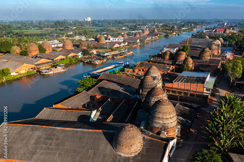 Canvastavla Aerial panoramic view of Mang Thit pottery village with traditional red brick kilns along the river in Vinh Long, Vietnam