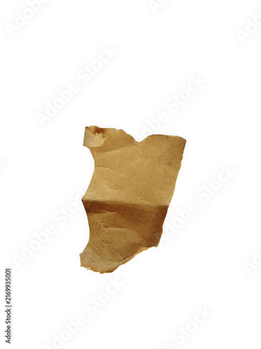 A single piece of torn brown paper scrap with rough edges