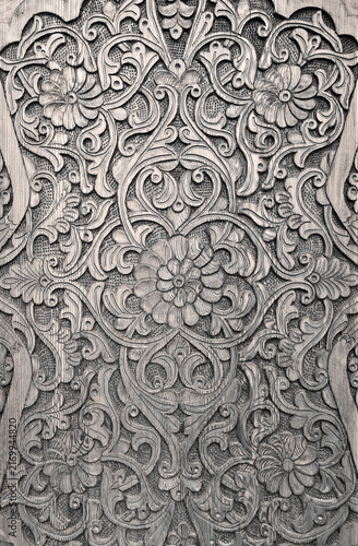 UZBEKISTAN - HANDCARVED WOODEN DOOR WITH FLORAL ORNAMENTS AND ARABESQUE MOTIFS - TRADITIONAL UZBEKISTAN CRAFTSMANSHIP FEATURES ORNATE WOOD CARVING, HANDMADE DECORATIVE ART AND VINTAGE DESIGN