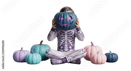 Person in Skeleton Costume with Pumpkin Head Surrounded by Pastel Pumpkins
