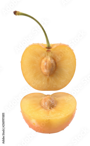 Fresh Yellow Cherry Fruit Cut in Half with Seed and Stem