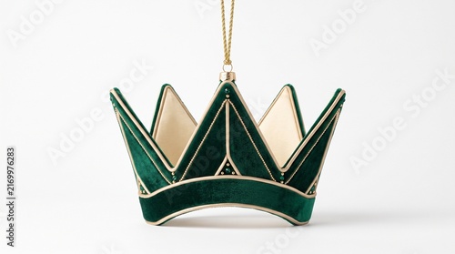 Fotografie Decorative green velvet crown ornament with gold trim for festive holiday tree d