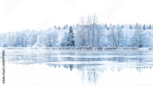 River landscape in a cold morning with snow and frost. Farnebofjarden national park in north of Sweden