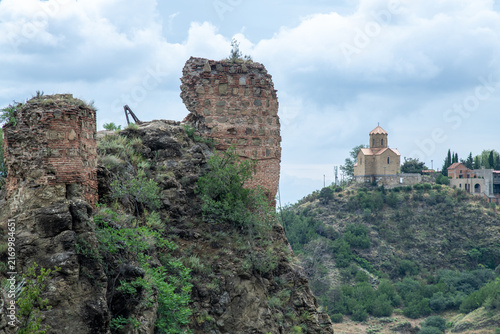 Obraz na płótnie Ancient Narikala Fortress ruins overlooking Tabor Monastery on hill in Tbilisi
