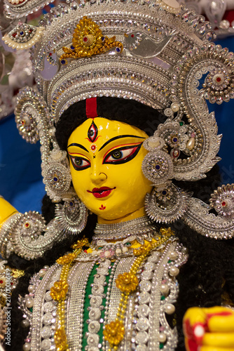 Narayanganj, Dhaka, Bangladesh - 20 October 2023: View of the ornate Durga Puja idol decorated with intricate silver jewelry and traditional ornaments.