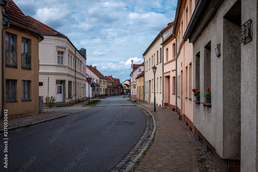 Fototapeta premium Historic street with traditional houses in Kremmen, Brandenburg, Germany