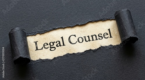Legal Counsel Text Revealed Under Torn Black Paper Background