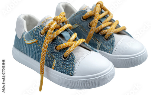 Obraz na plátne Childrens footwear ready for school attendance with comfortable sneakers prepare