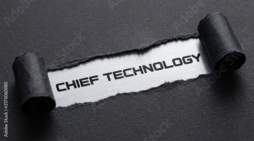 Chief Technology Text Revealed Under Torn Ripped Black Paper
