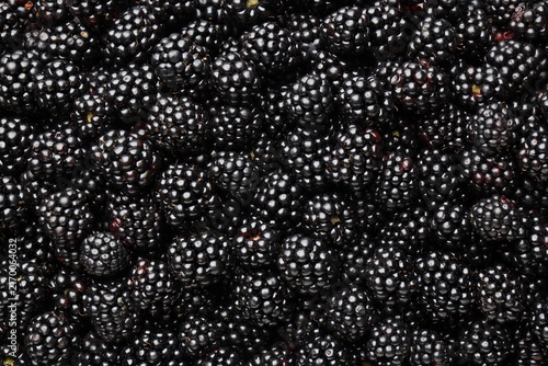 Fotografie Heap of ripe tasty blackberries as background, closeup