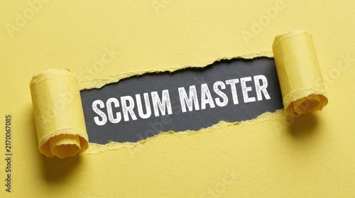 Scrum Master Text Revealed Through Torn Yellow Paper Background