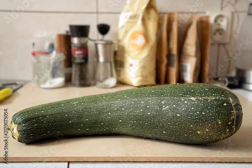 Konstfotografi Fresh, green courgettes on the kitchen worktop – healthy summer vegetables from the cucurbit family, perfect for cooking and vegetarian meals