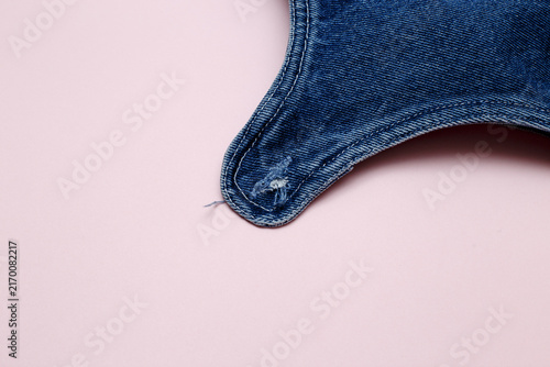 Quadro su tela Poorly sewn buttonhole on denim fabric with stitching defect