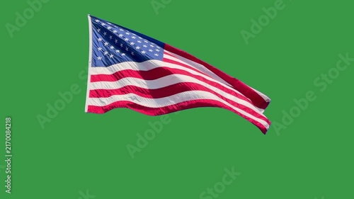 American flag waves and flows in slow motion against a green screen background for chroma key compositing and patriotic video productions. 15326  