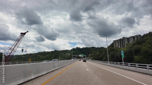Driver's point of view approaching and entering the Squirrel Hill Tunnel on Interstate 376 while traveling toward Pittsburgh, Pennsylvania. 15323  