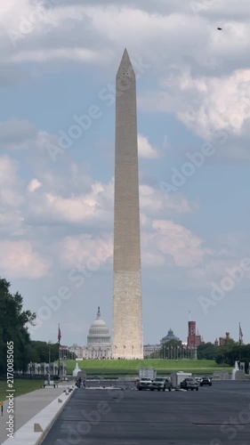 WASHINGTON DC - August 24, 2026 - Vertical long shot view of crews repairing the drained Lincoln Memorial Reflecting Pool with the Washington Monument and U.S. Capitol visible in the distance. 15331  