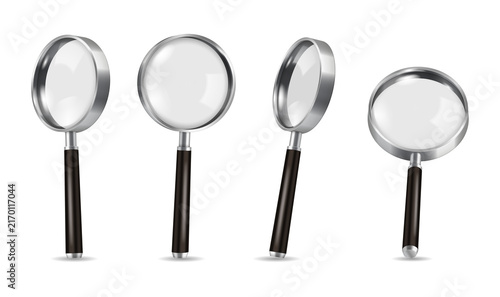 Fotografía Four magnifying glasses on dark surfaces for investigation on transparent backgr