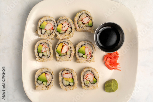 Canvastavla brown  rice sushi   served with soy sauce