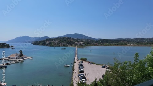 4K Timelapse capturing movement along planespotting causeway with boat passing near Corfu Airport, Greece