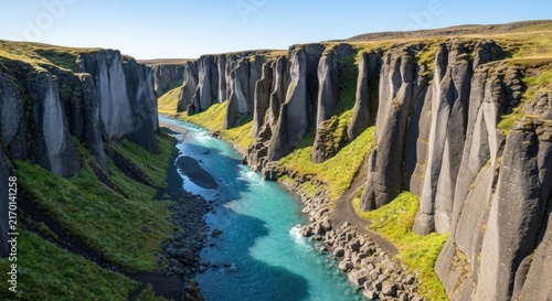 Majestic canyon with turquoise river and vertical rock formations