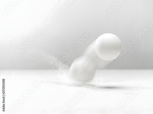 White Tennis Ball Impacting Powdery Surface in Motion in Soft Bright Studio