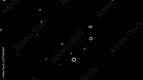 Underwater bubble overlay on alpha channles with glowing white orbs, ideal for adding a magical touch to underwater footage or fantasy designs.