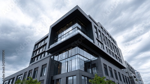 Modern Urban Architecture of a Stylish Office Building Under Clouds