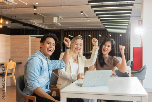 Group of powerful diversity creative people high five on air to greeting power of team. Multiethnic businesspeople working together. Collaboration in Business Team success. StrongTeamwork concept.