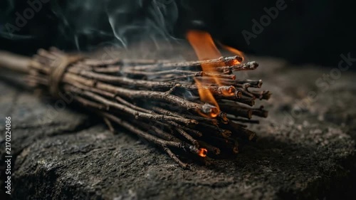 Spooky 4K Cinematic Smoldering Witch Broom with Glowing Embers and Rising Eerie Smoke on Mystical Dark Stone Background
