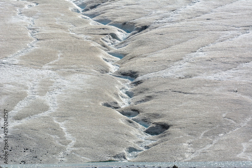 Bild auf Leinwand Deep crevasse cutting across the icy surface of Athabasca Glacier at Columbia Ic